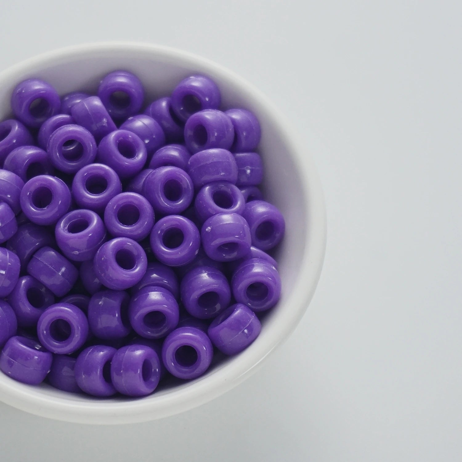 BD00037-03-indigo-purple-barrel-opaque-pony-beads-6×9mm