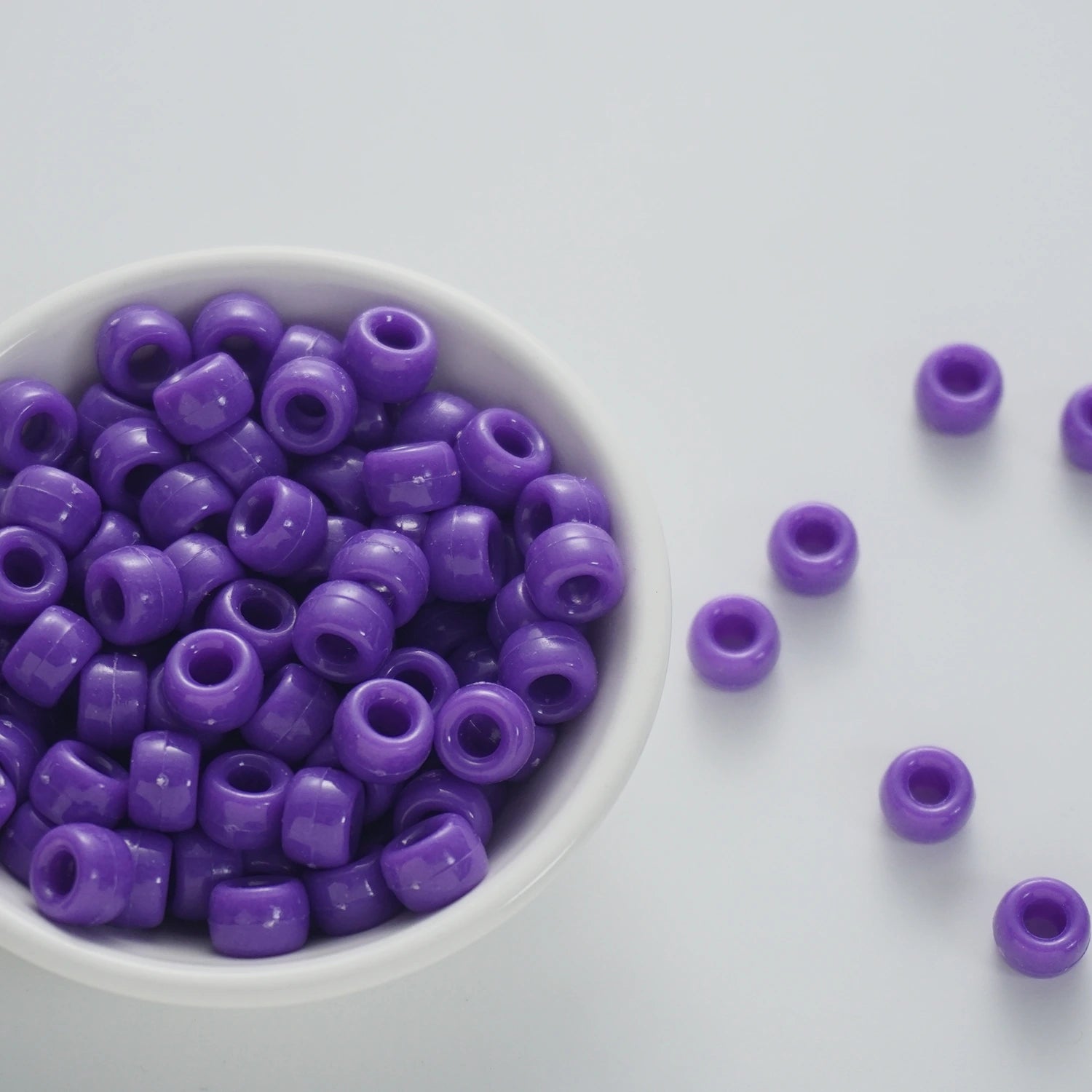 BD00037-04-indigo-purple-barrel-opaque-pony-beads-6×9mm
