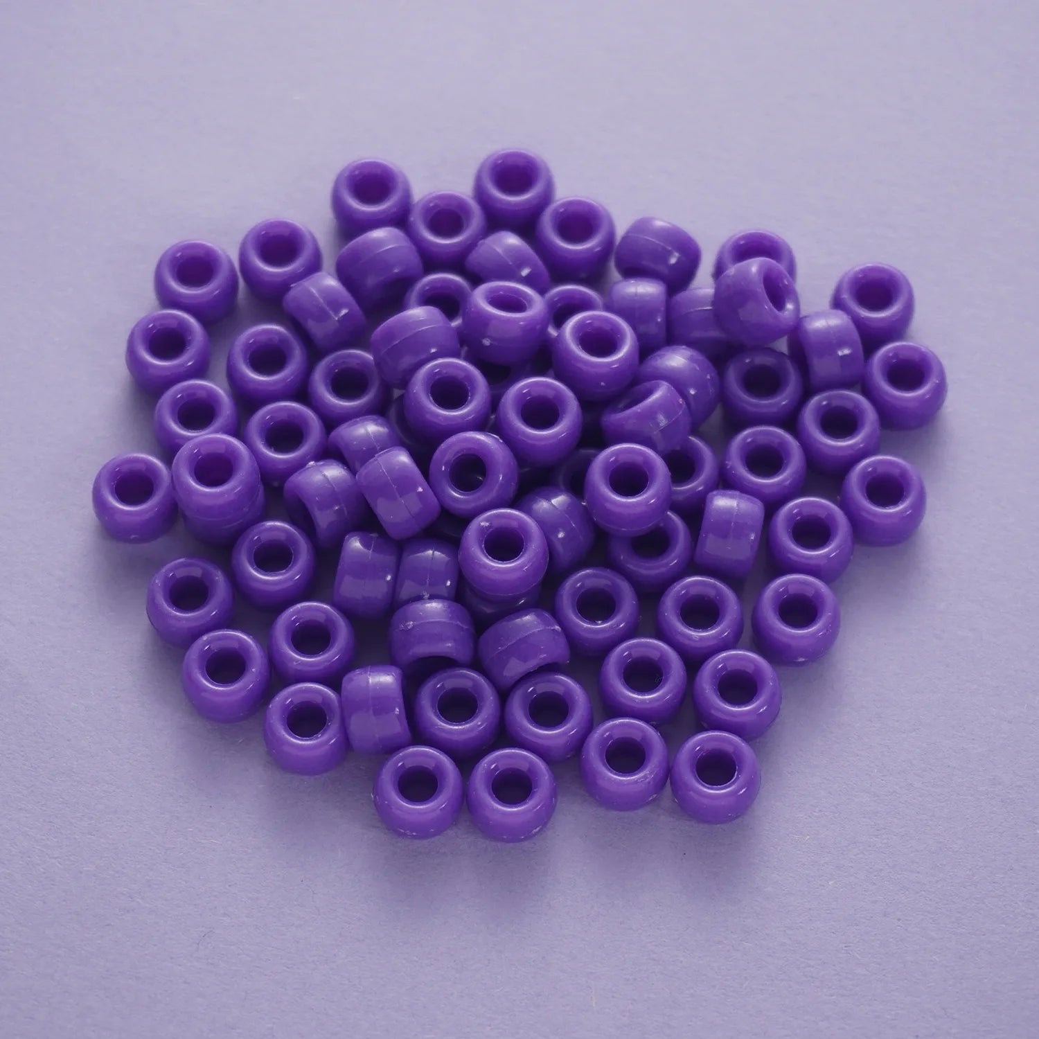 BD00037-05-indigo-purple-barrel-opaque-pony-beads-6×9mm