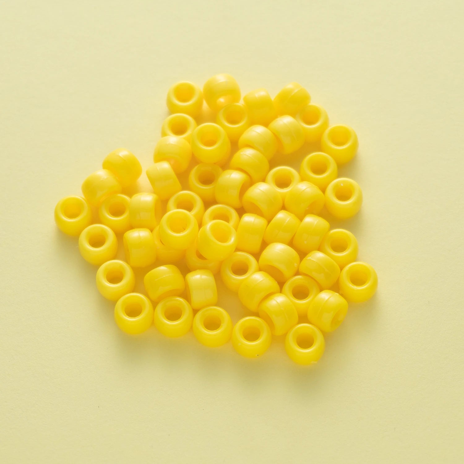 BD00039-05-corn-yellow-barrel-opaque-pony-beads-6×9mm
