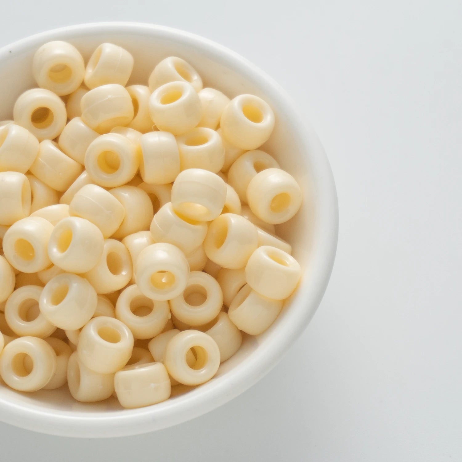 BD00040-03-cream-yellow-barrel-opaque-pony-beads-6×9mm