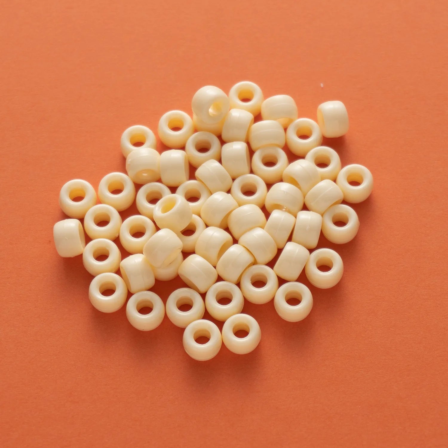 BD00040-05-cream-yellow-barrel-opaque-pony-beads-6×9mm