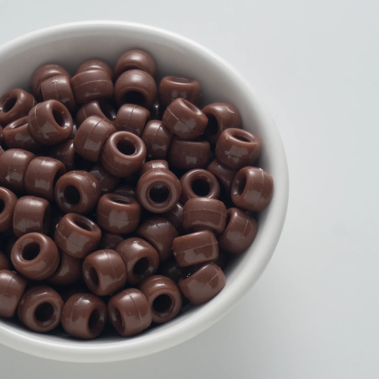 BD00045-03-coffee-brown-barrel-opaque-pony-beads-6×9mm