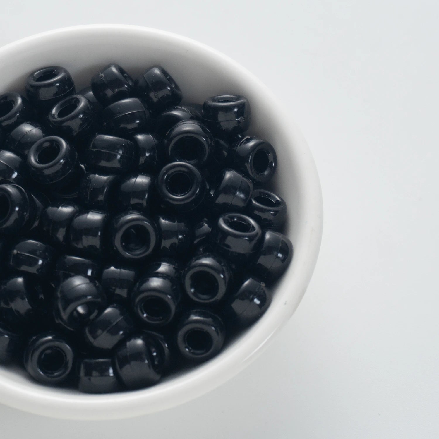 BD00048-03-pure-black-barrel-opaque-pony-beads-6×9mm