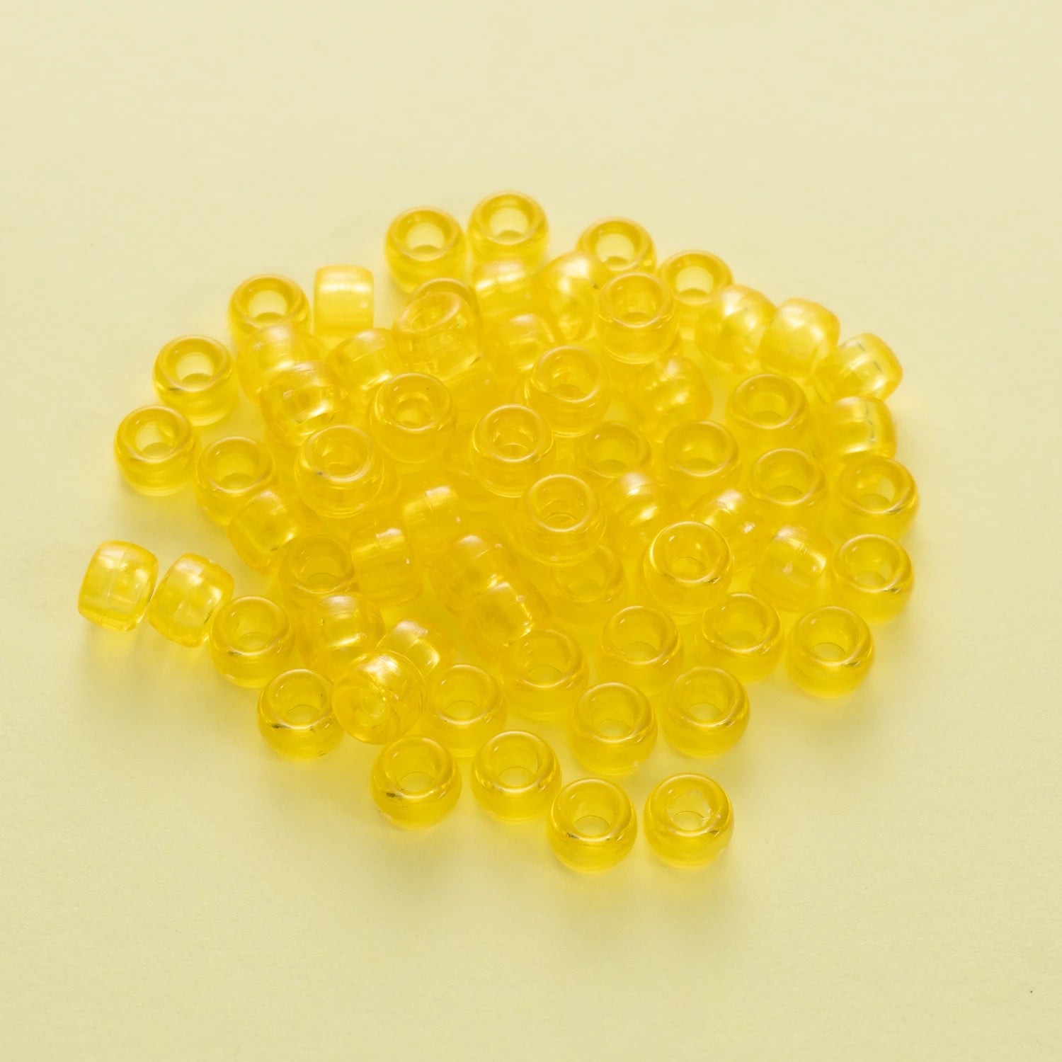 BD00051-05-cyber-yellow-barrel-transparent-pony-beads-6×9mm