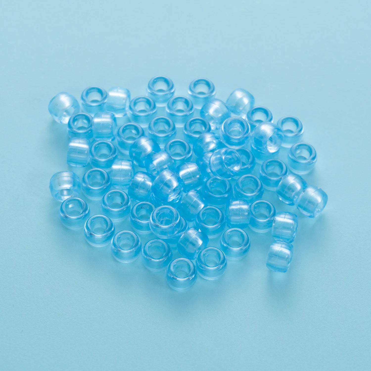BD00070-05-baby-blue-barrel-transparent-pony-beads-6×9mm