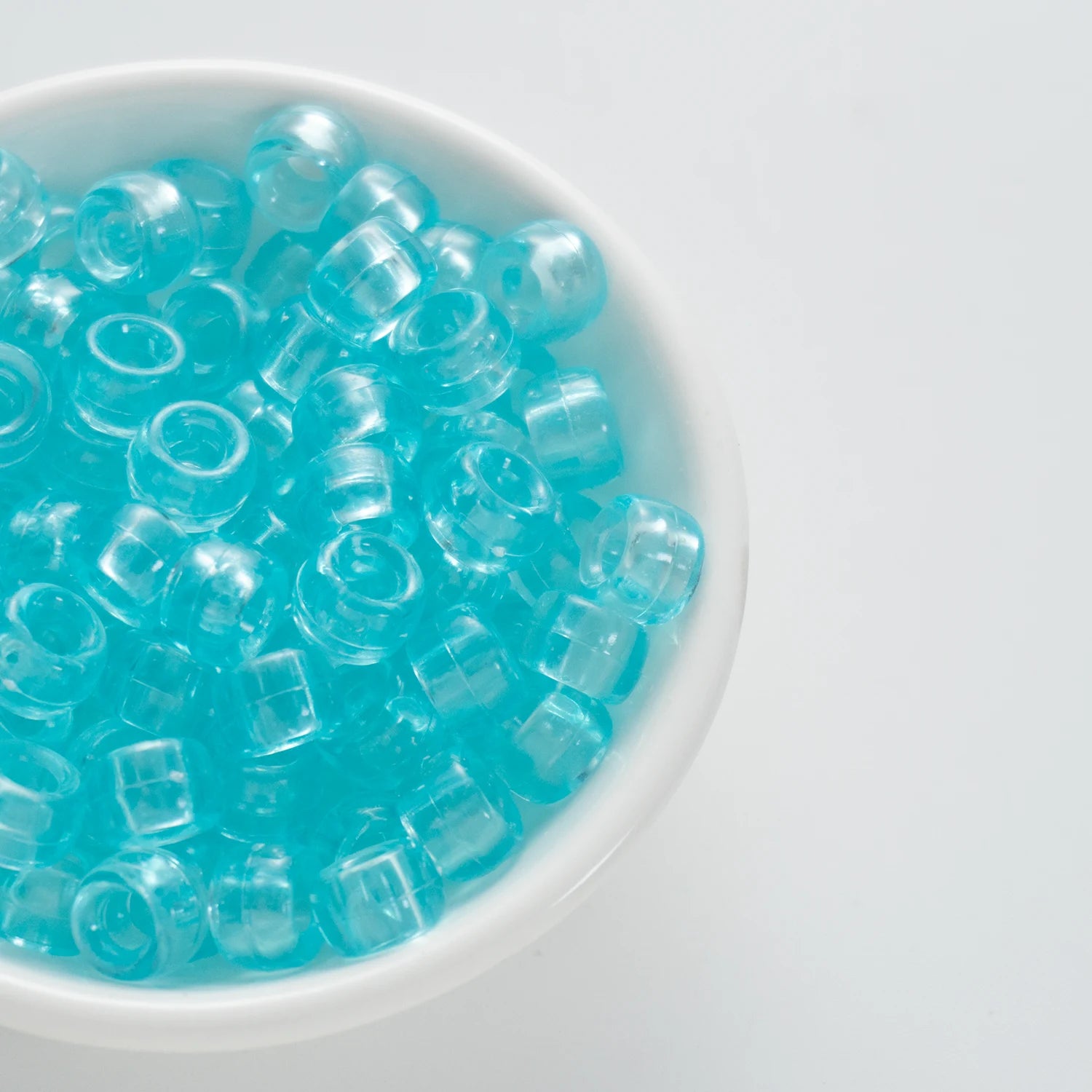 BD00071-03-celeste-blue-barrel-transparent-pony-beads-6×9mm