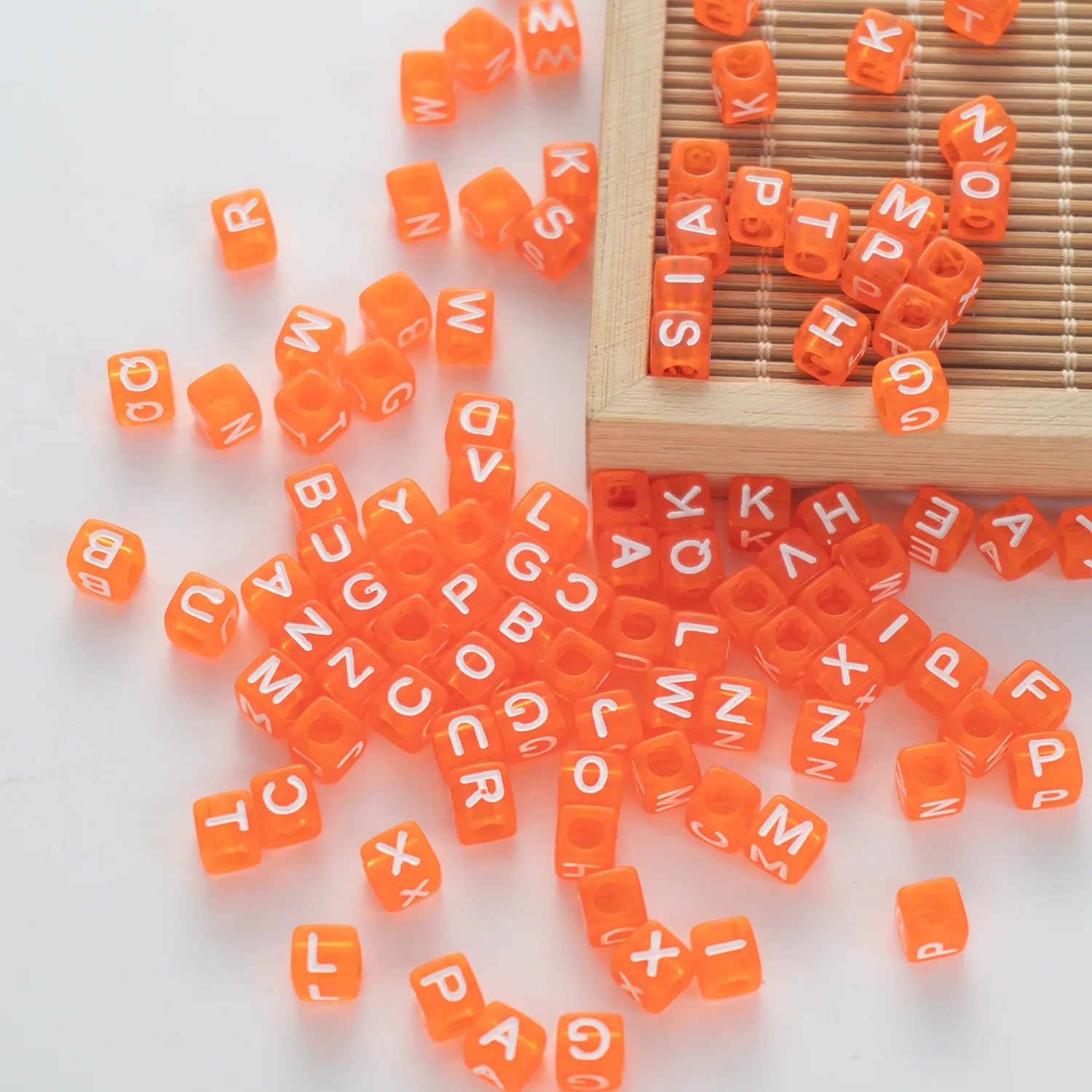 BD00078-05-white-letter-bright-orange-transparent-cube-alphabet-beads-mix-6mm