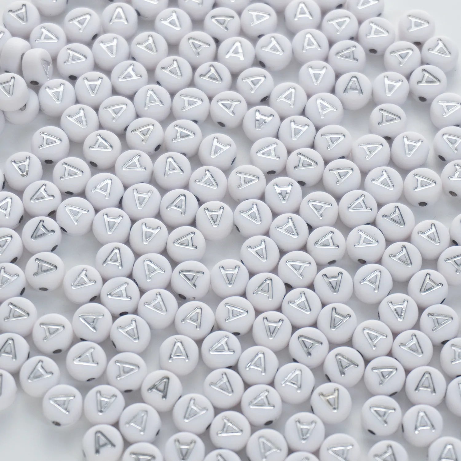 BD00084-02-silver-letter-white-opaque-coin-alphabet-beads-single-a-4×7mm