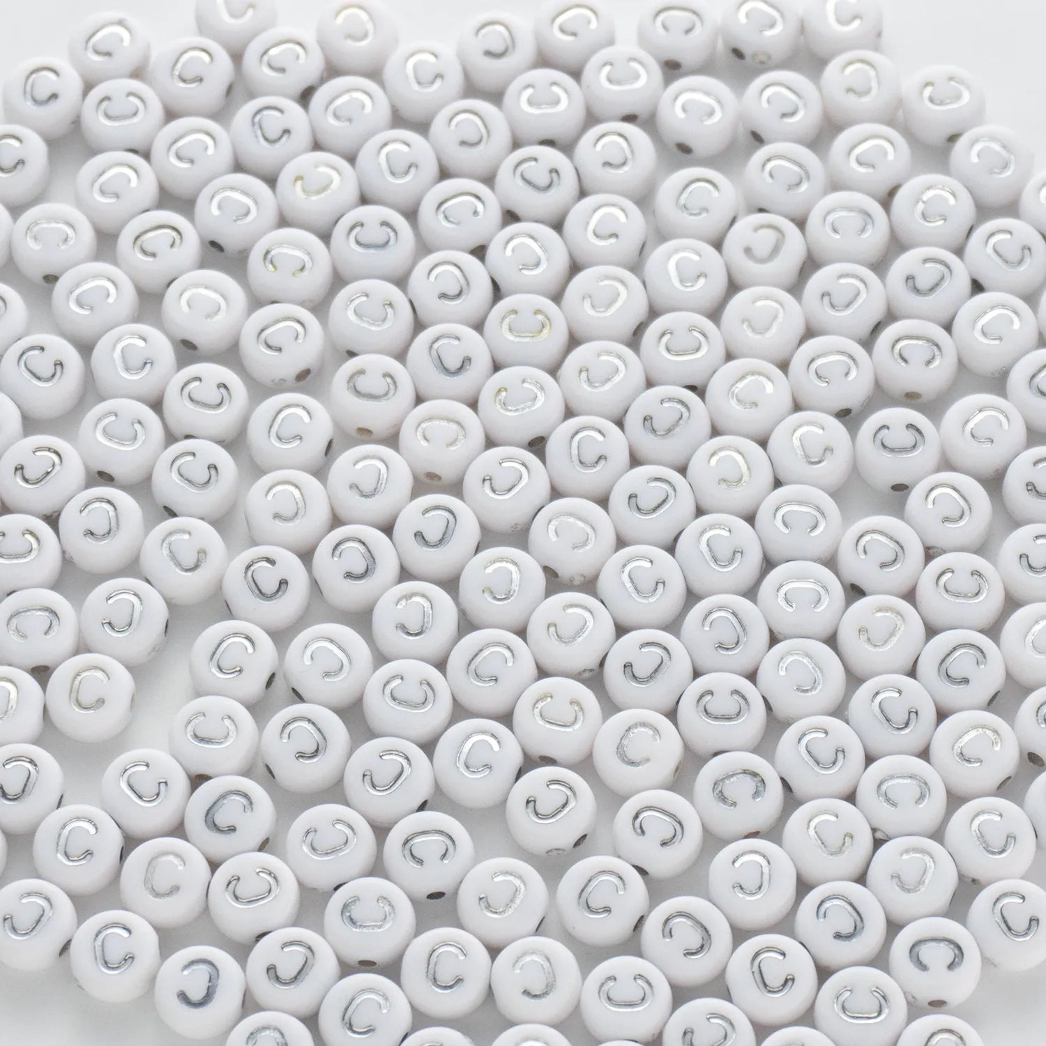 BD00086-02-silver-letter-white-opaque-coin-alphabet-beads-single-c-4×7mm