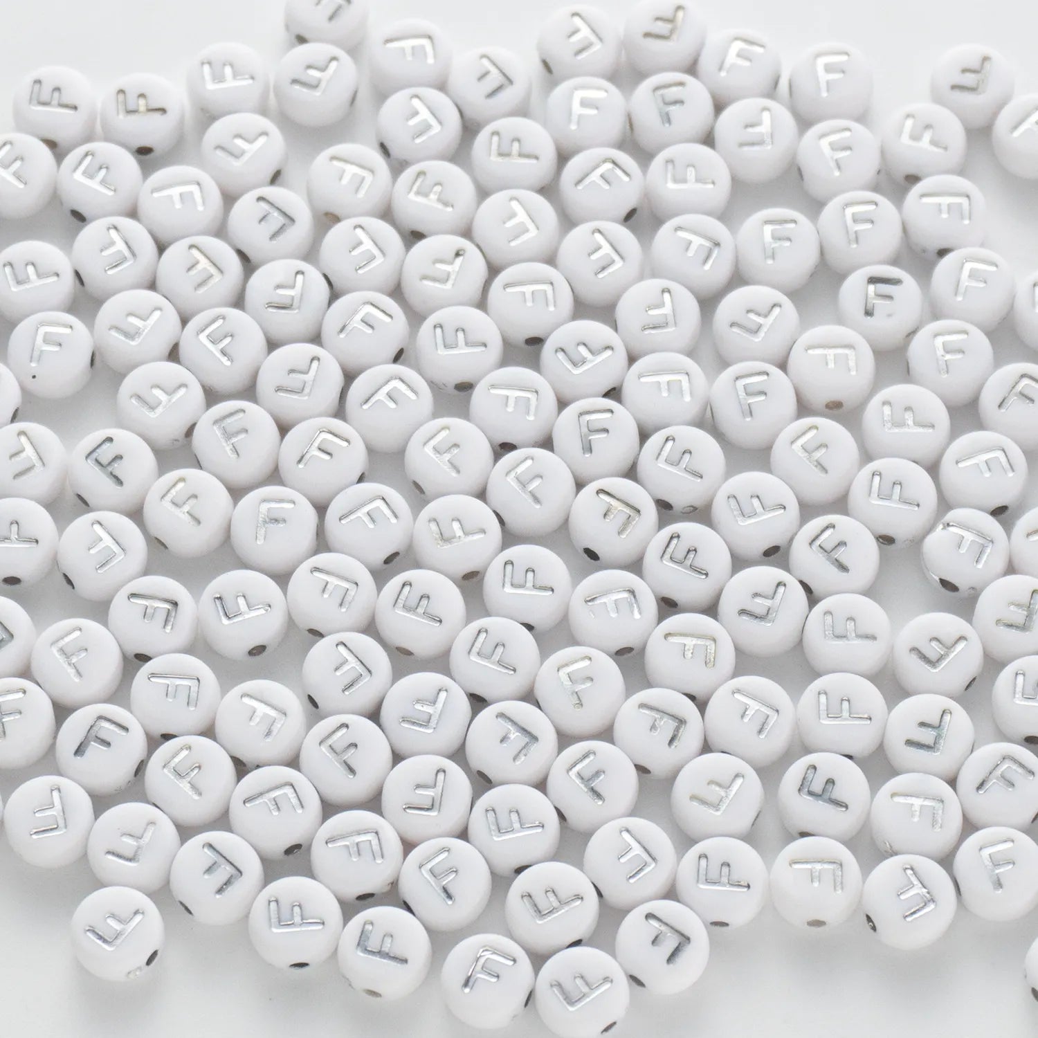 BD00089-02-silver-letter-white-opaque-coin-alphabet-beads-single-f-4×7mm