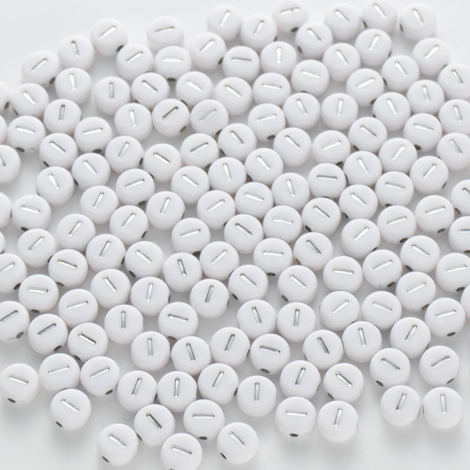BD00092-02-silver-letter-white-opaque-coin-alphabet-beads-single-i-4×7mm