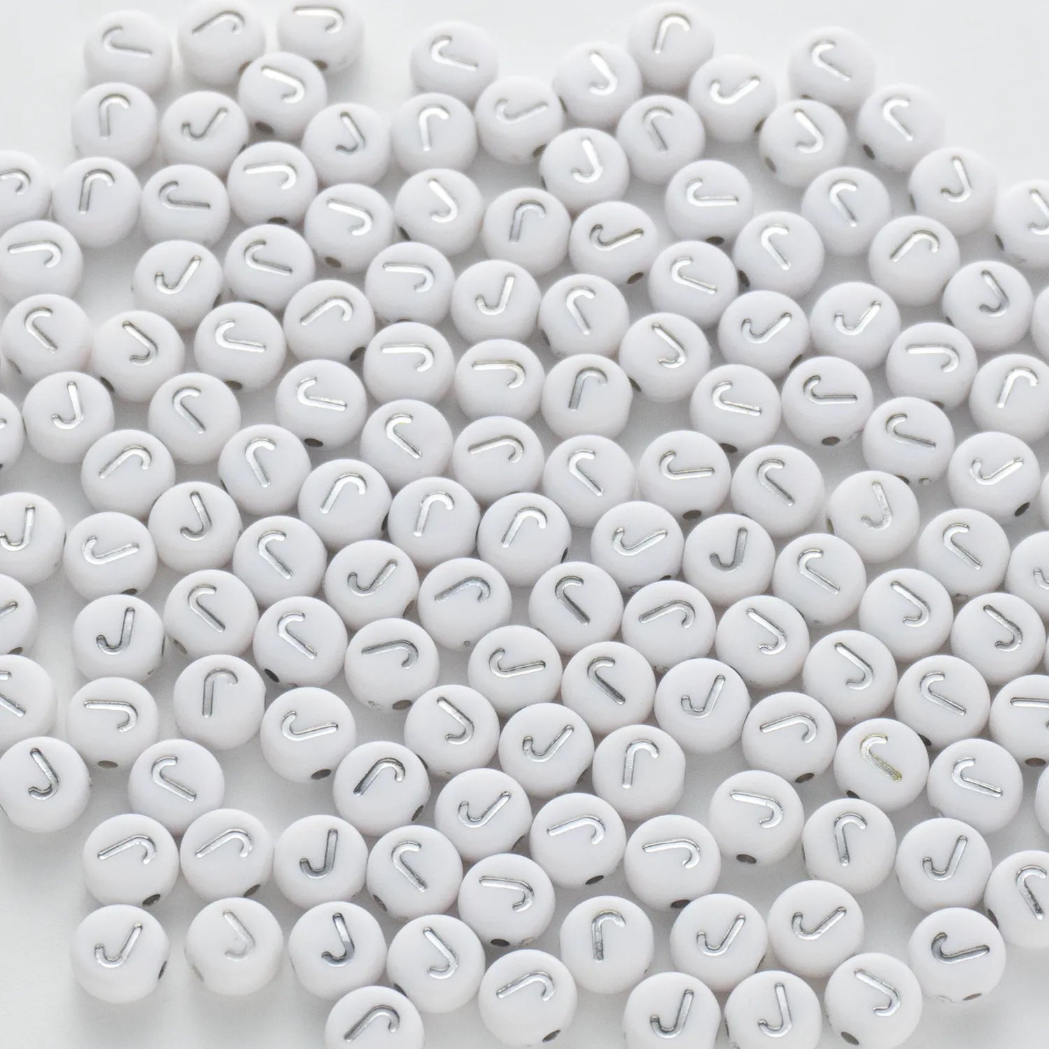 BD00093-02-silver-letter-white-opaque-coin-alphabet-beads-single-j-4×7mm