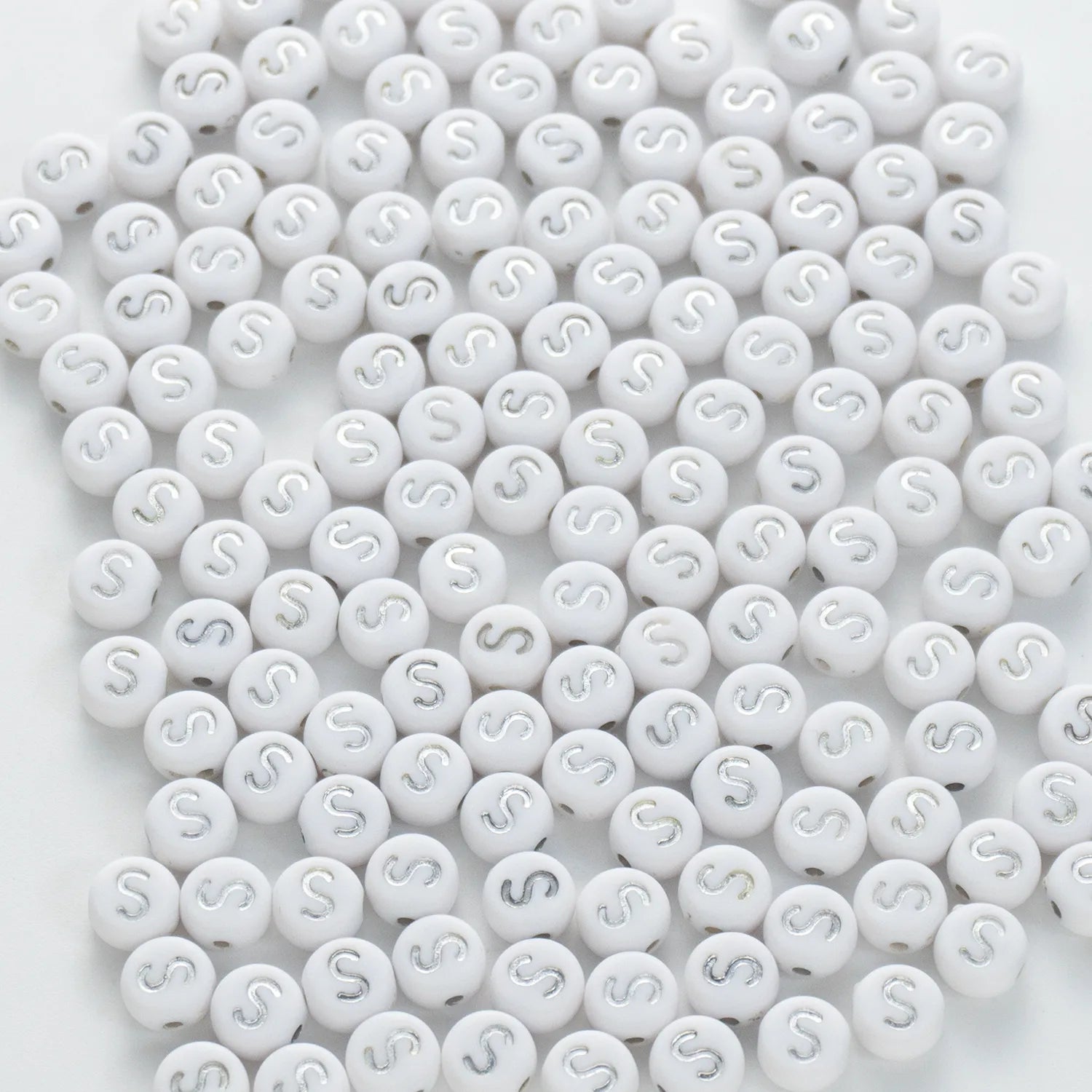 BD00102-02-silver-letter-white-opaque-coin-alphabet-beads-single-s-4×7mm
