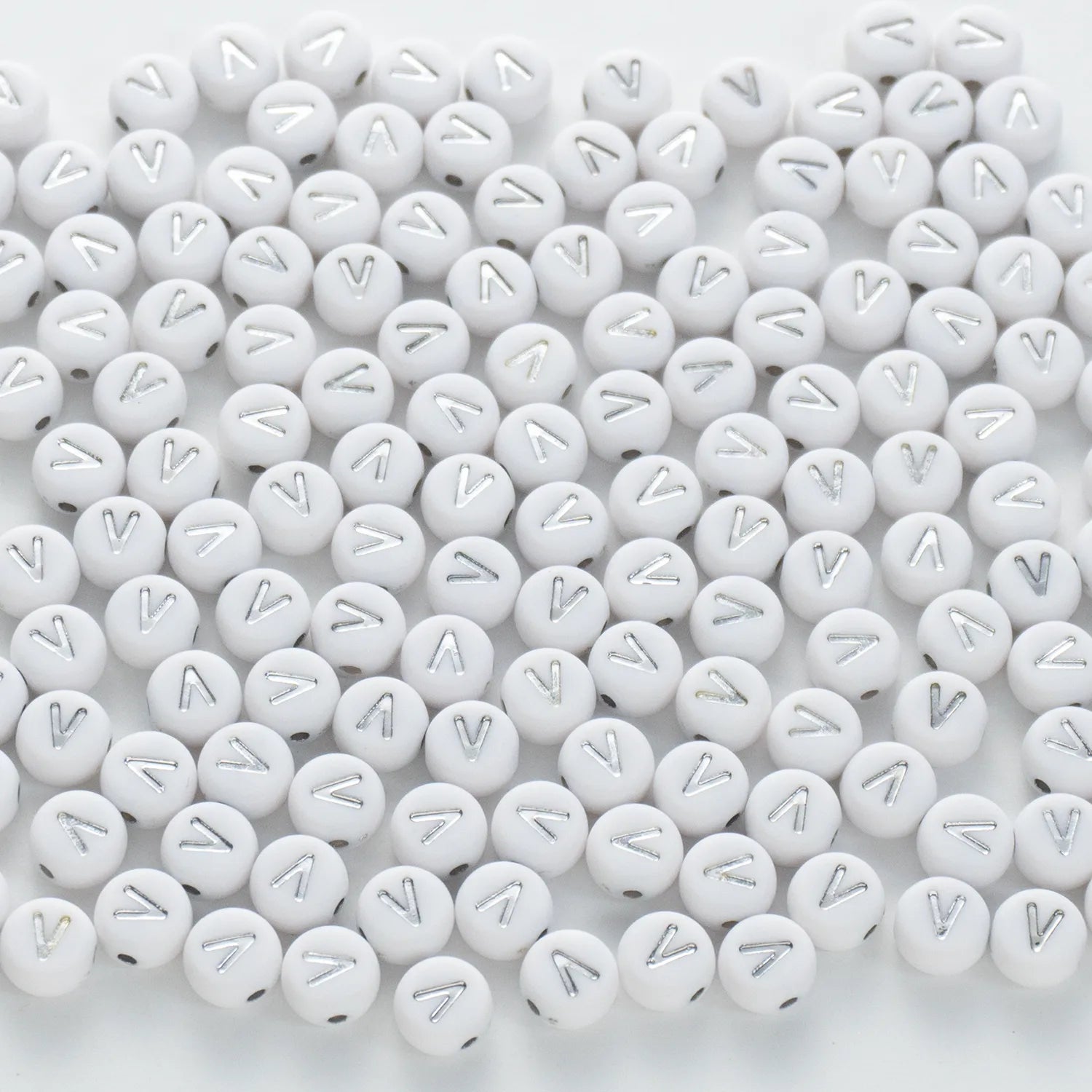 BD00105-02-silver-letter-white-opaque-coin-alphabet-beads-single-v-4×7mm