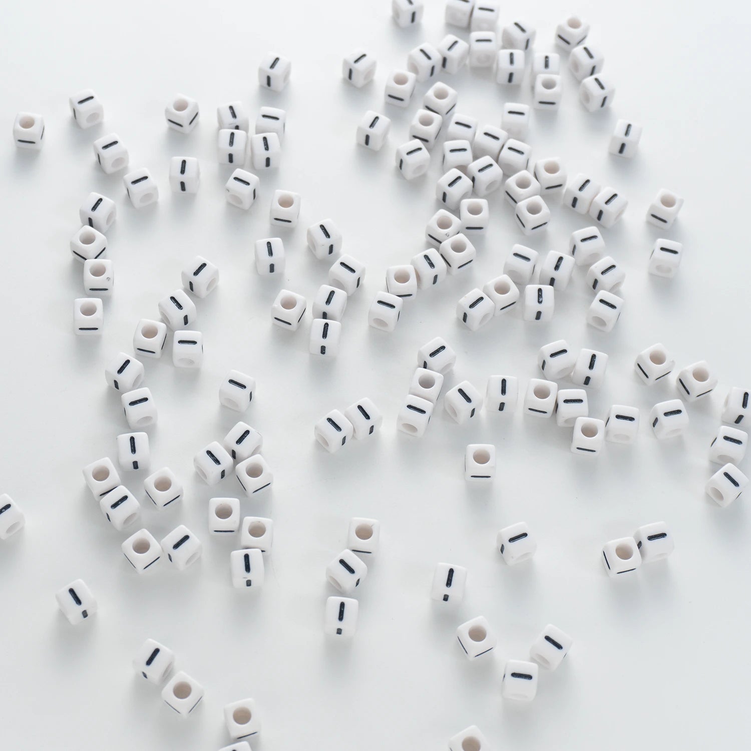 BD00120-03-black-letter-white-opaque-cube-alphabet-beads-single-i-7mm
