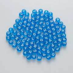 BW-00041-BD-02-white-letter-dark-blue-transparent-coin-alphabet-beads-mix-4×7mm