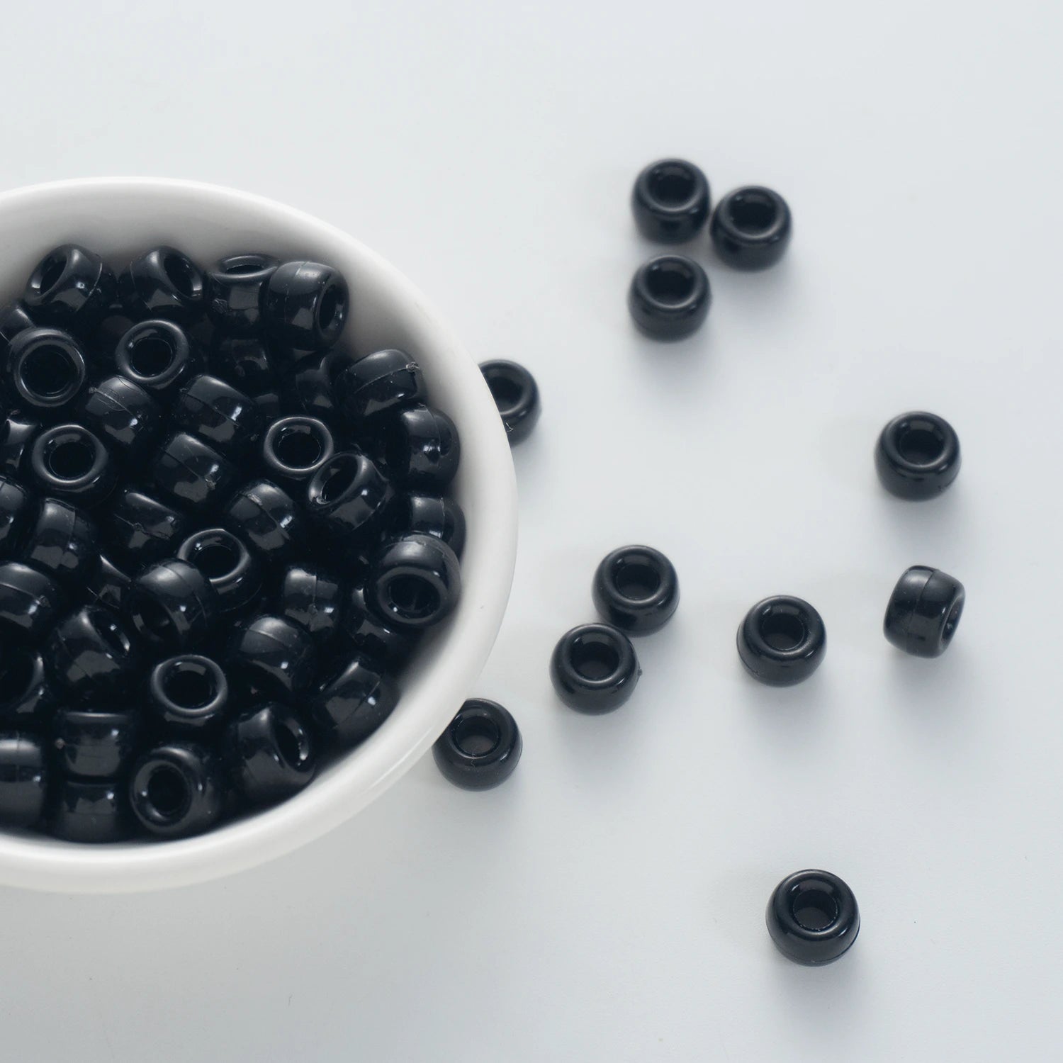 BW-00048-BD-04-pure-black-barrel-opaque-pony-beads-6×9mm