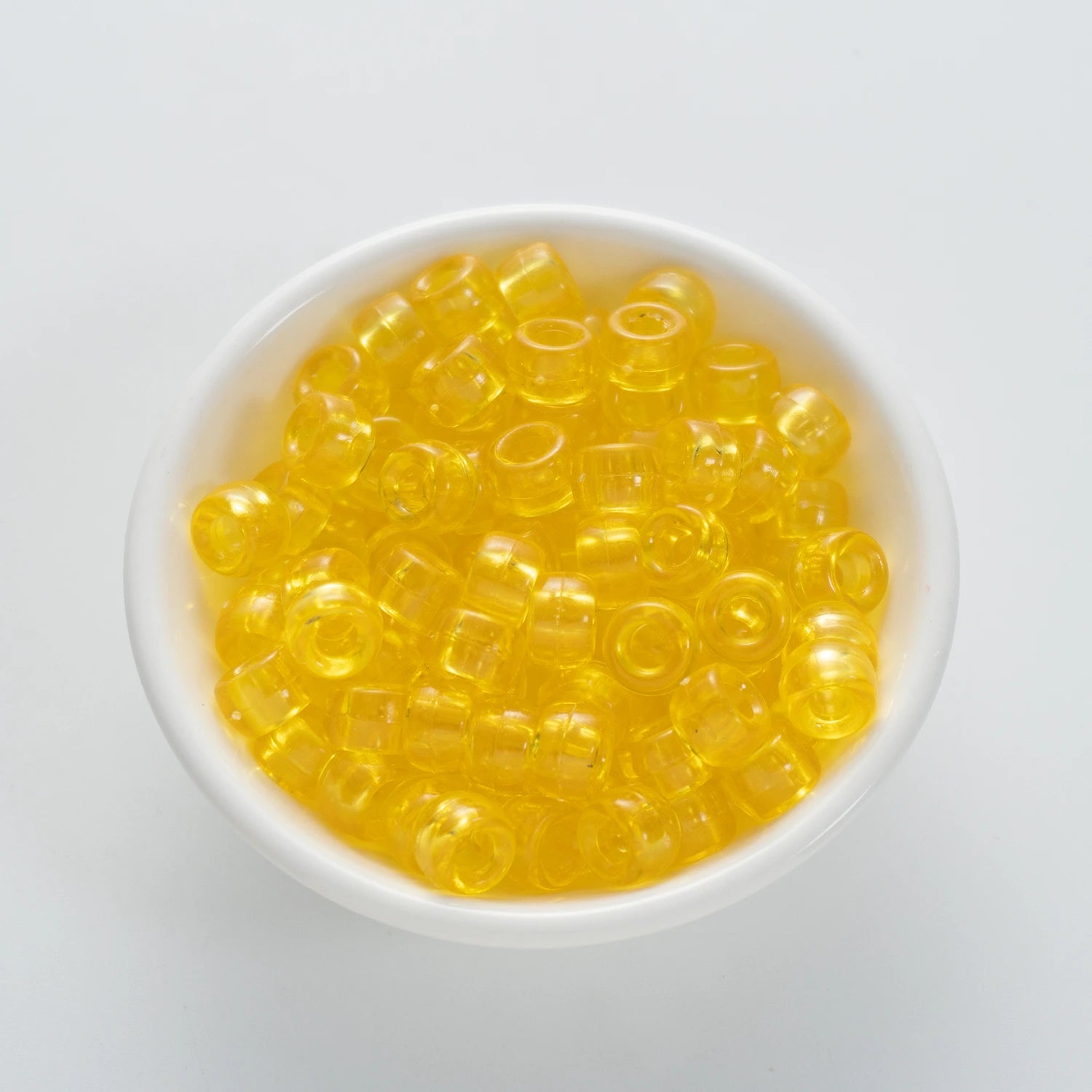 BW-00051-BD-01-cyber-yellow-barrel-transparent-pony-beads-6×9mm