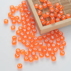 BW-00058-BD-05-white-letter-bright-orange-transparent-coin-alphabet-beads-mix-4×7mm