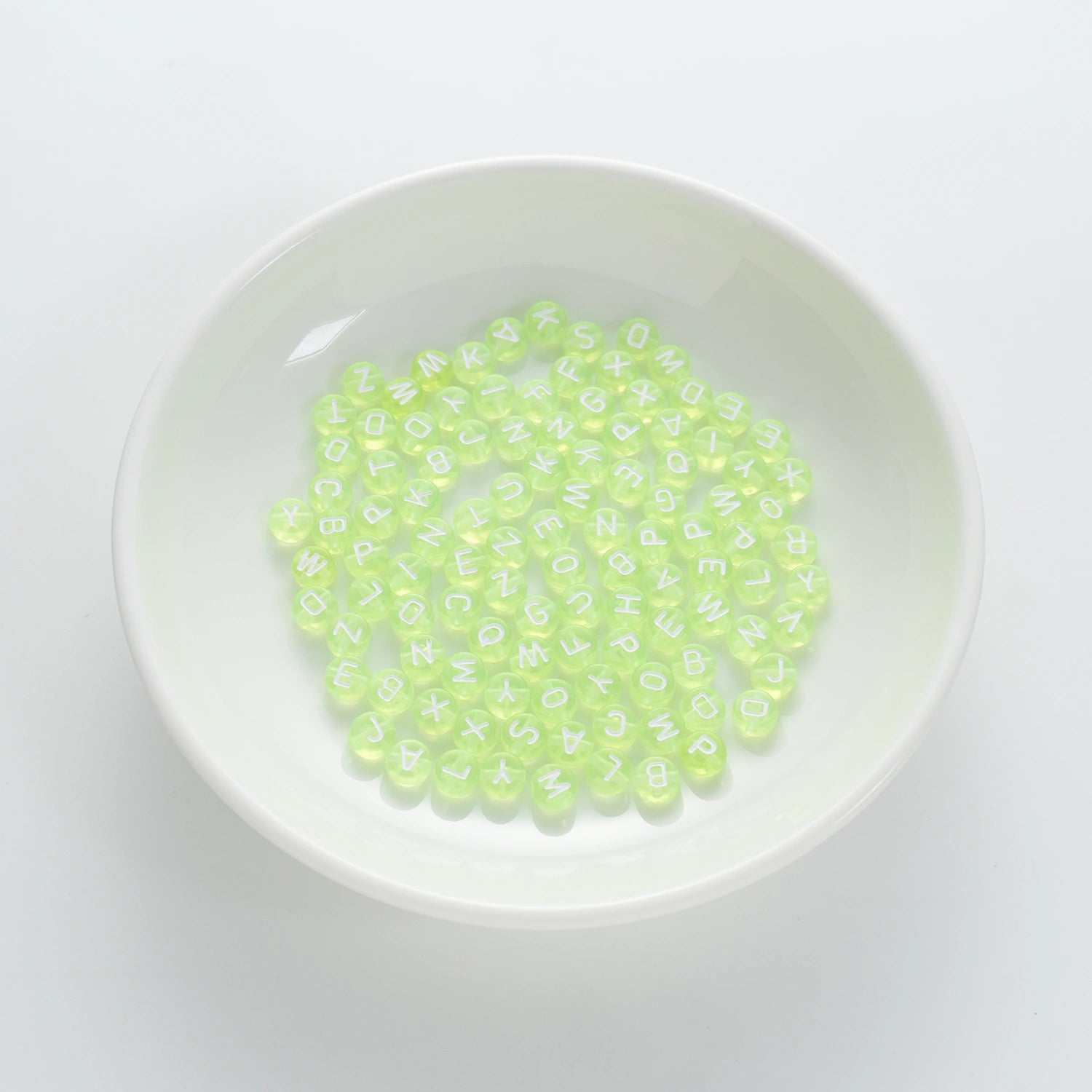 BW-00062-BD-01-white-letter-tea-green-transparent-coin-alphabet-beads-mix-4×7mm
