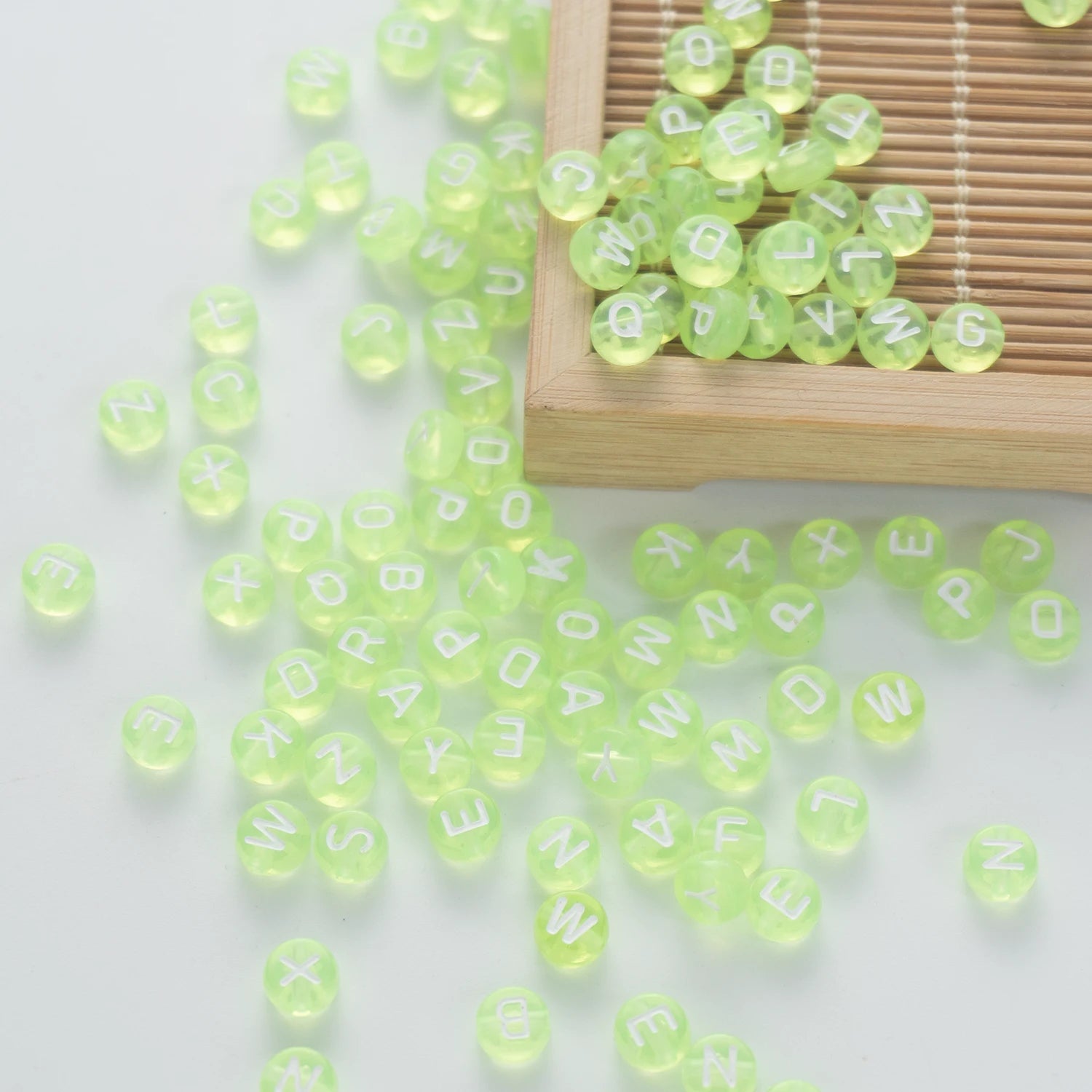BW-00062-BD-05-white-letter-tea-green-transparent-coin-alphabet-beads-mix-4×7mm