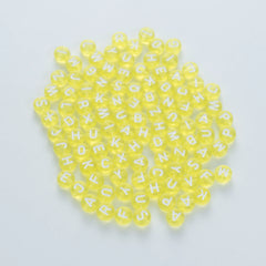 BW-00063-BD-02-white-letter-bright-yellow-transparent-coin-alphabet-beads-mix-4×7mm