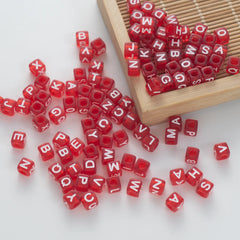 BW-00073-BD-05-white-letter-dark-red-transparent-cube-alphabet-beads-mix-6mm