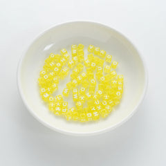BW-00075-BD-01-white-letter-bright-yellow-transparent-cube-alphabet-beads-mix-6mm