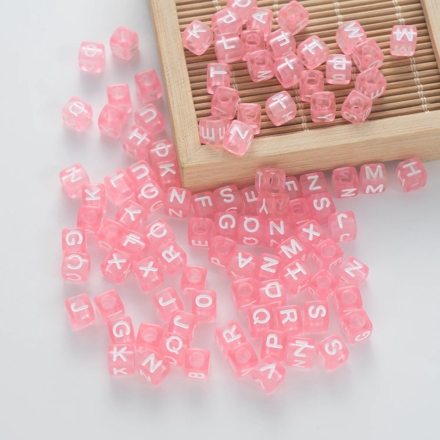 BW-00076-BD-05-white-letter-pastel-pink-transparent-cube-alphabet-beads-mix-6mm