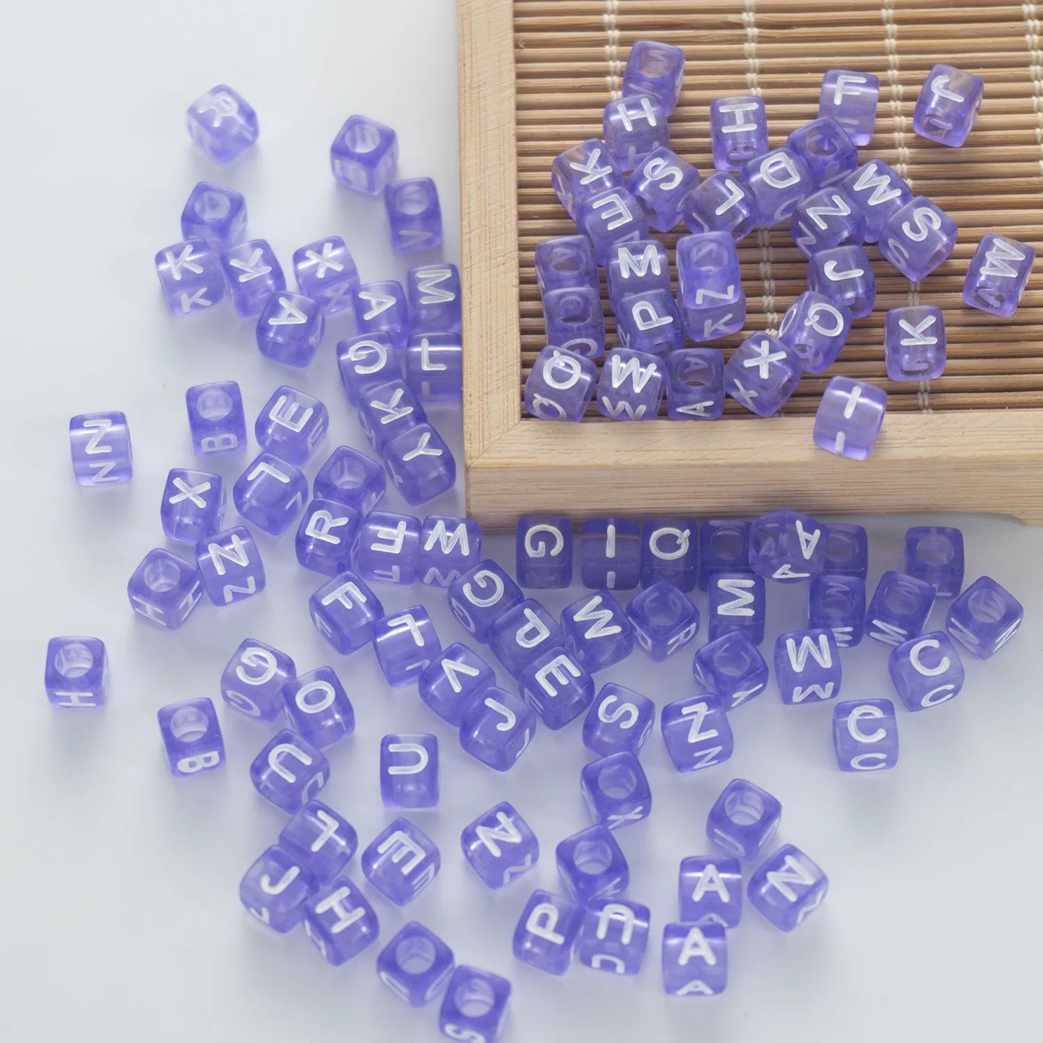 BW-00077-BD-05-white-letter-pastel-purple-transparent-cube-alphabet-beads-mix-6mm