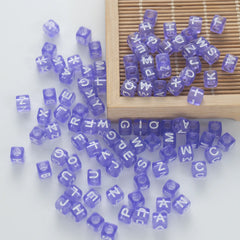 BW-00077-BD-05-white-letter-pastel-purple-transparent-cube-alphabet-beads-mix-6mm