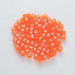 BW-00078-BD-02-white-letter-bright-orange-transparent-cube-alphabet-beads-mix-6mm