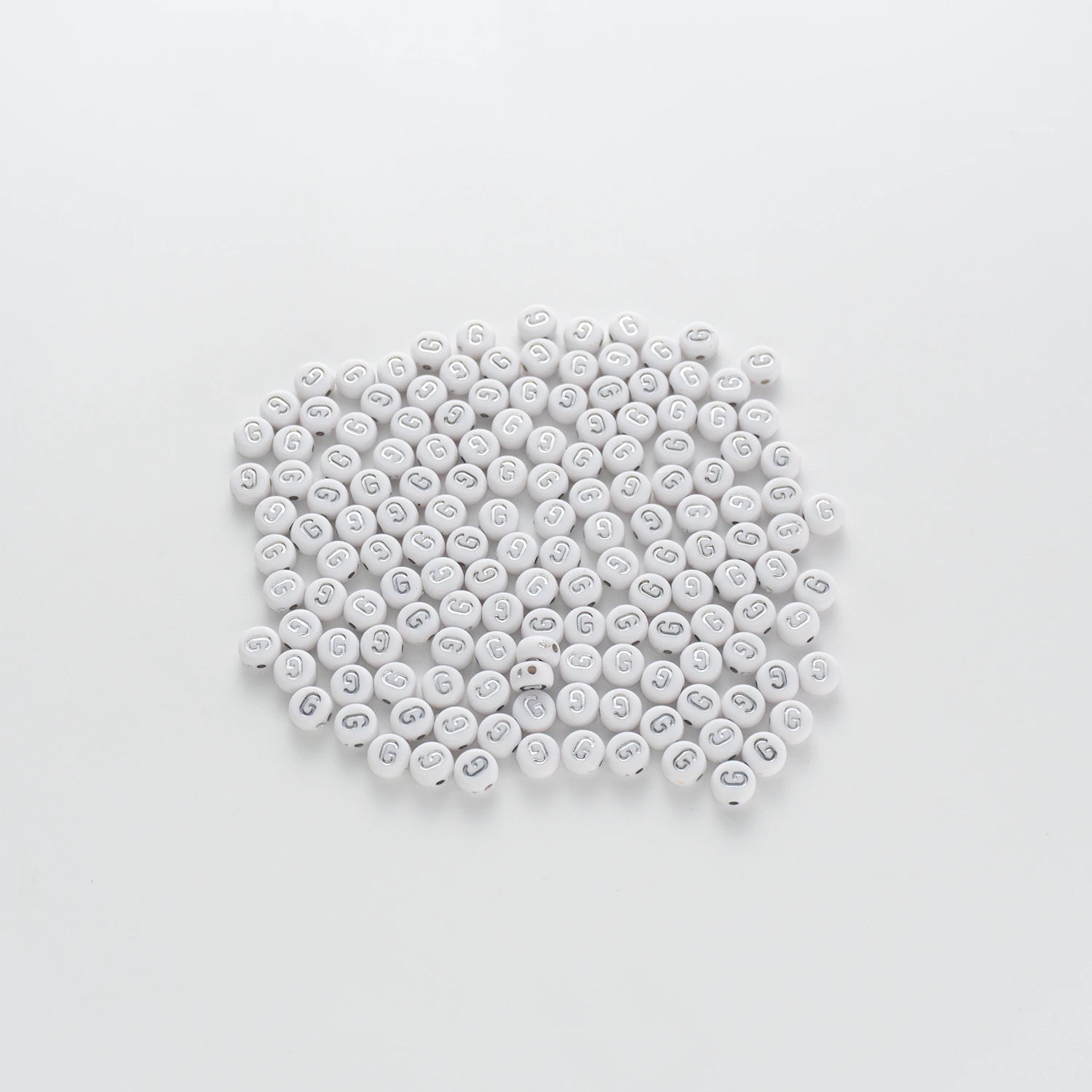 BW-00090-BD-02-silver-letter-white-opaque-coin-alphabet-beads-single-g-4×7mm