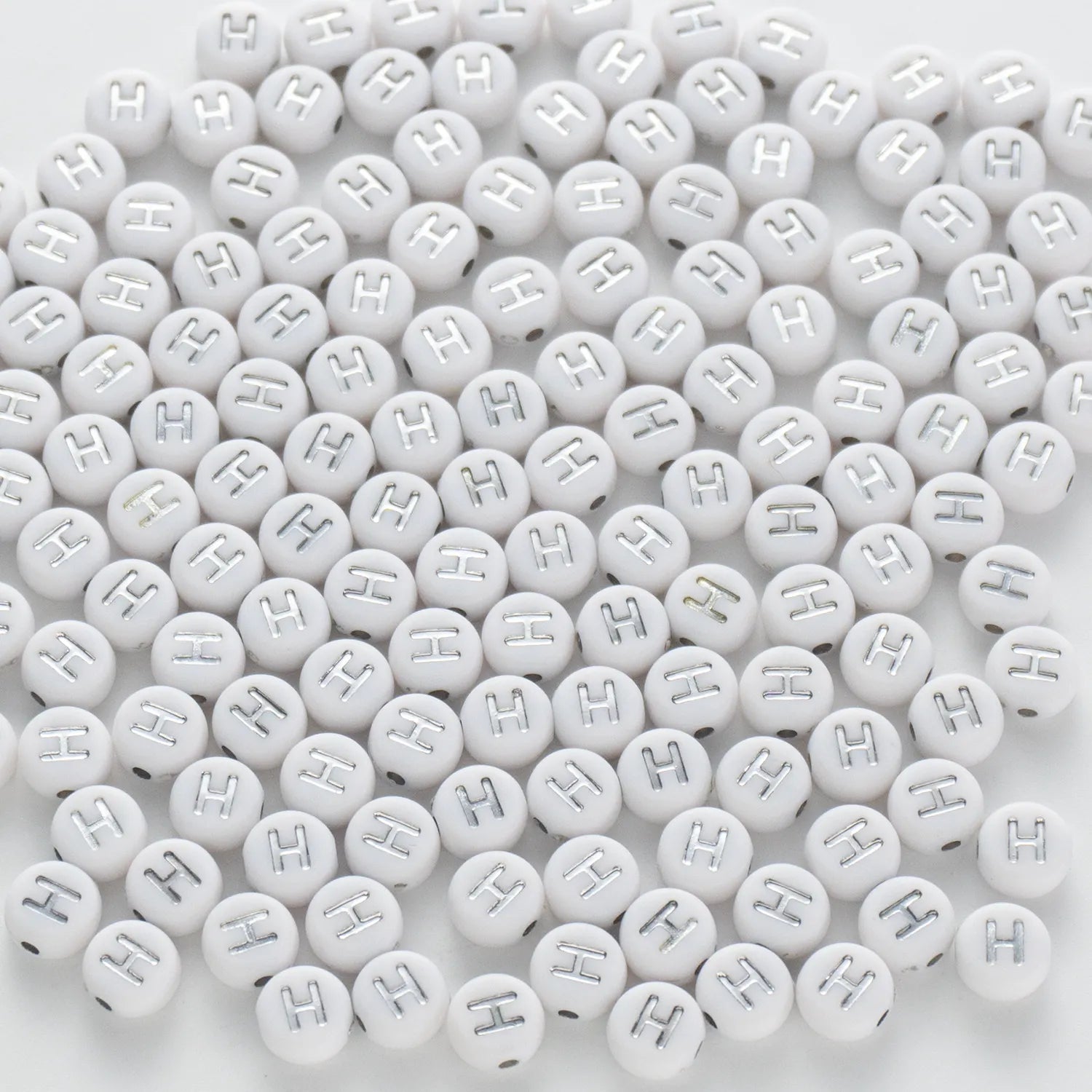 BW-00091-BD-02-silver-letter-white-opaque-coin-alphabet-beads-single-h-4×7mm
