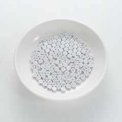 BW-00104-BD-01-silver-letter-white-opaque-coin-alphabet-beads-single-u-4×7mm