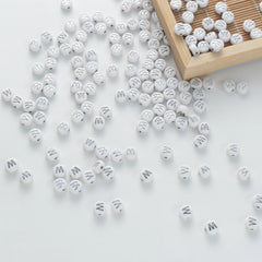 BW-00106-BD-05-silver-letter-white-opaque-coin-alphabet-beads-single-w-4×7mm