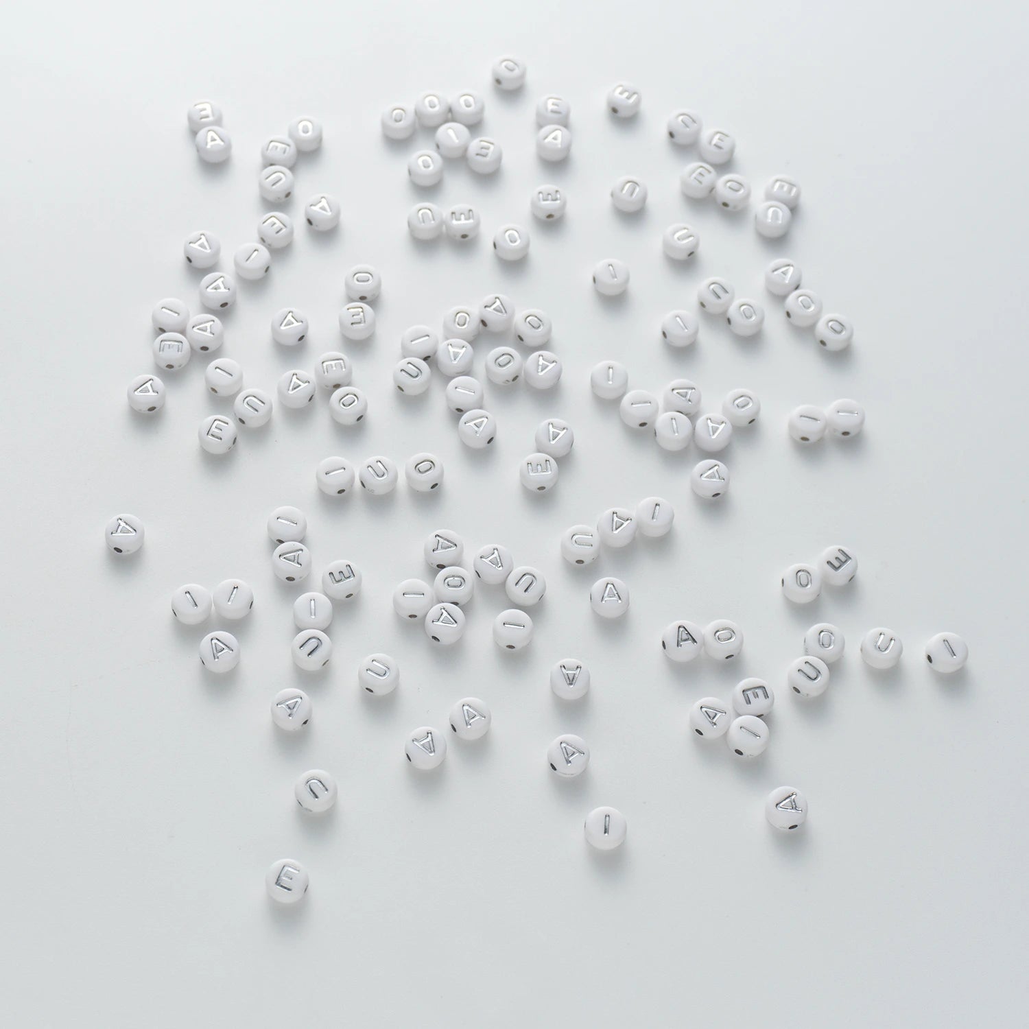 BW-00110-BD-03-silver-letter-white-opaque-coin-vowel-alphabet-beads-mix-4×7mm