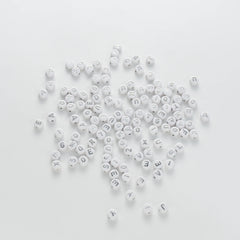 BW-00111-BD-03-silver-letter-white-opaque-coin-alphabet-beads-mix-4×7mm