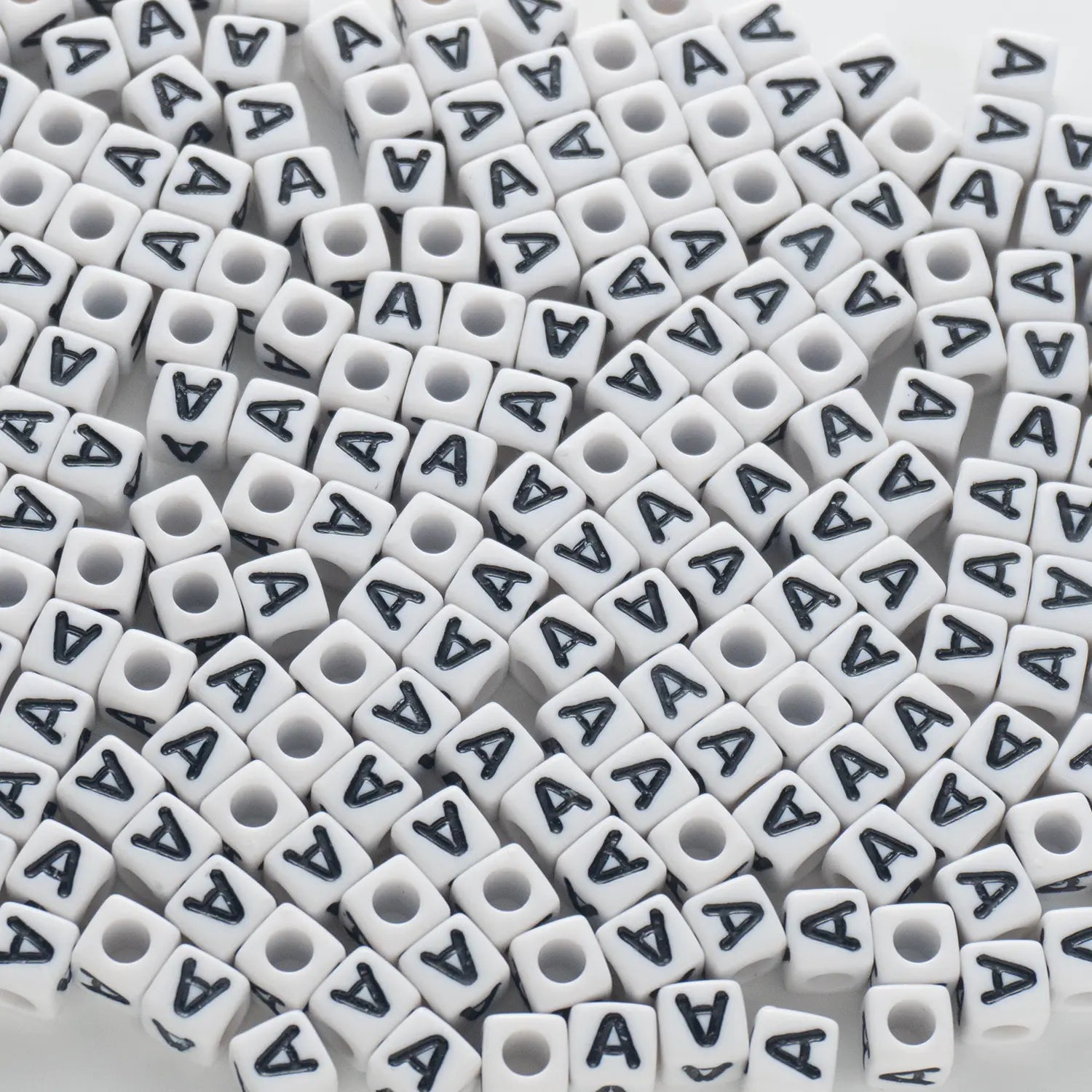 BW-00112-BD-02-black-letter-white-opaque-cube-alphabet-beads-single-a-7mm
