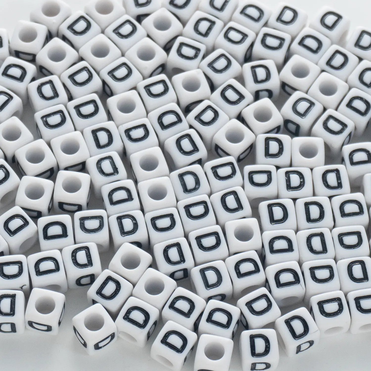 BW-00115-BD-02-black-letter-white-opaque-cube-alphabet-beads-single-d-7mm