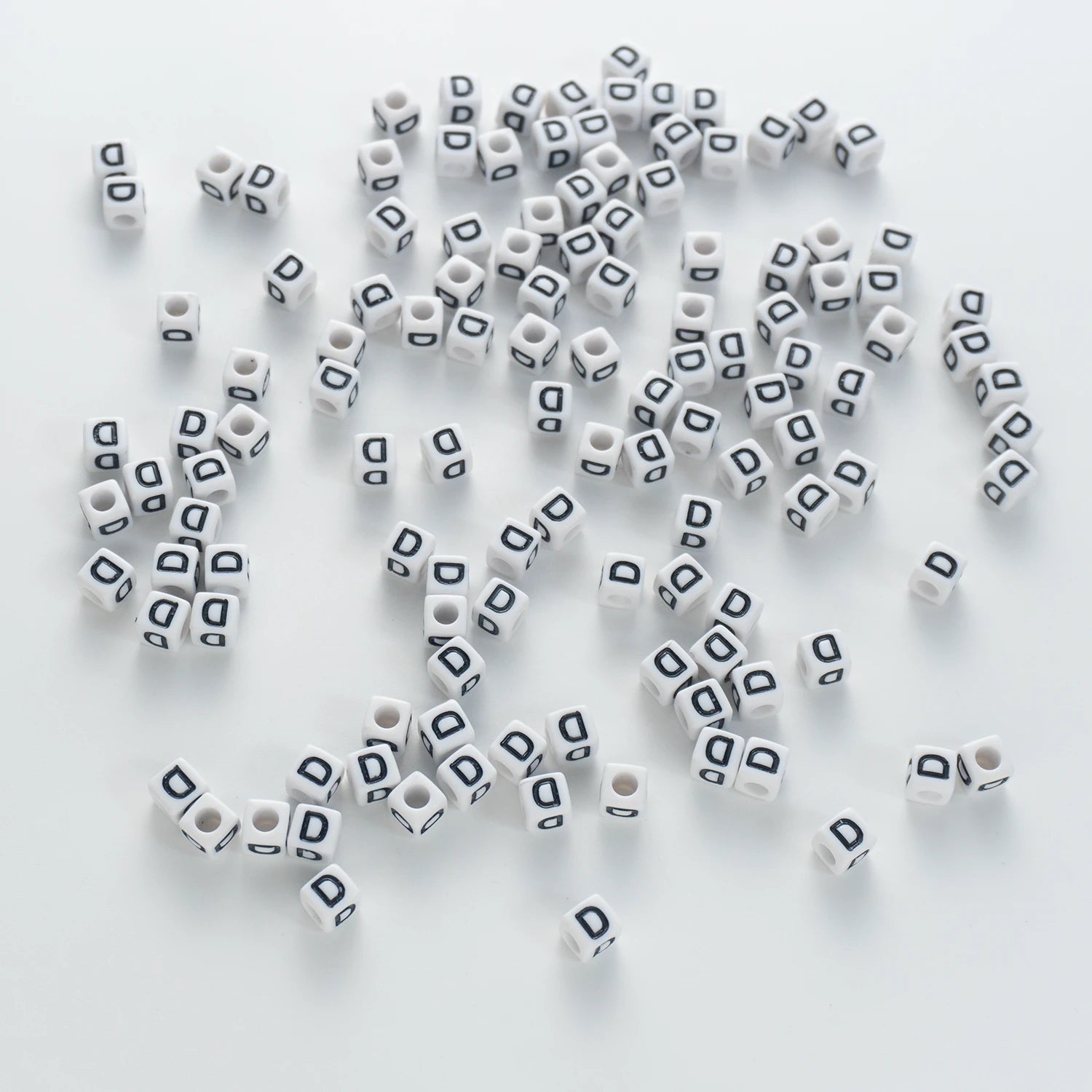 BW-00115-BD-03-black-letter-white-opaque-cube-alphabet-beads-single-d-7mm