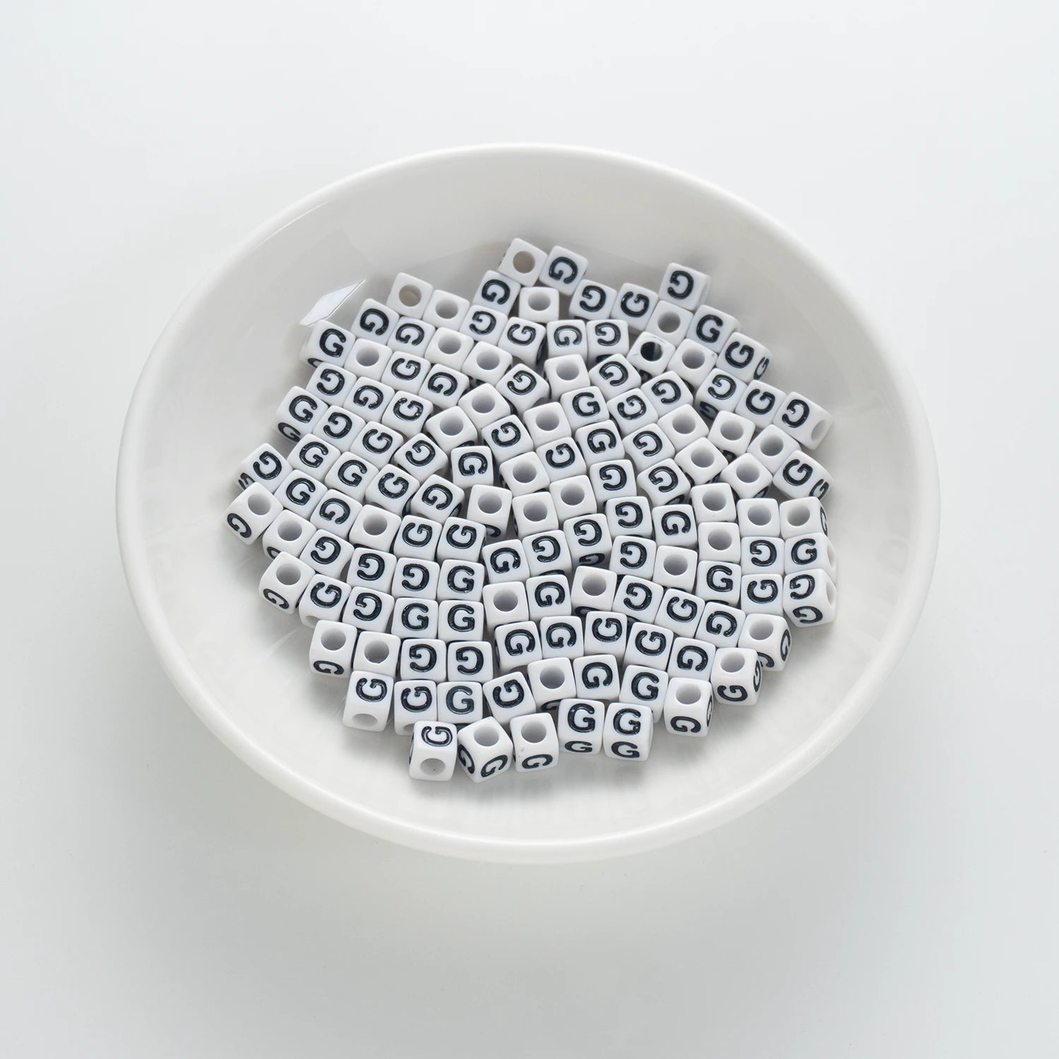 BW-00118-BD-01-black-letter-white-opaque-cube-alphabet-beads-single-g-7mm