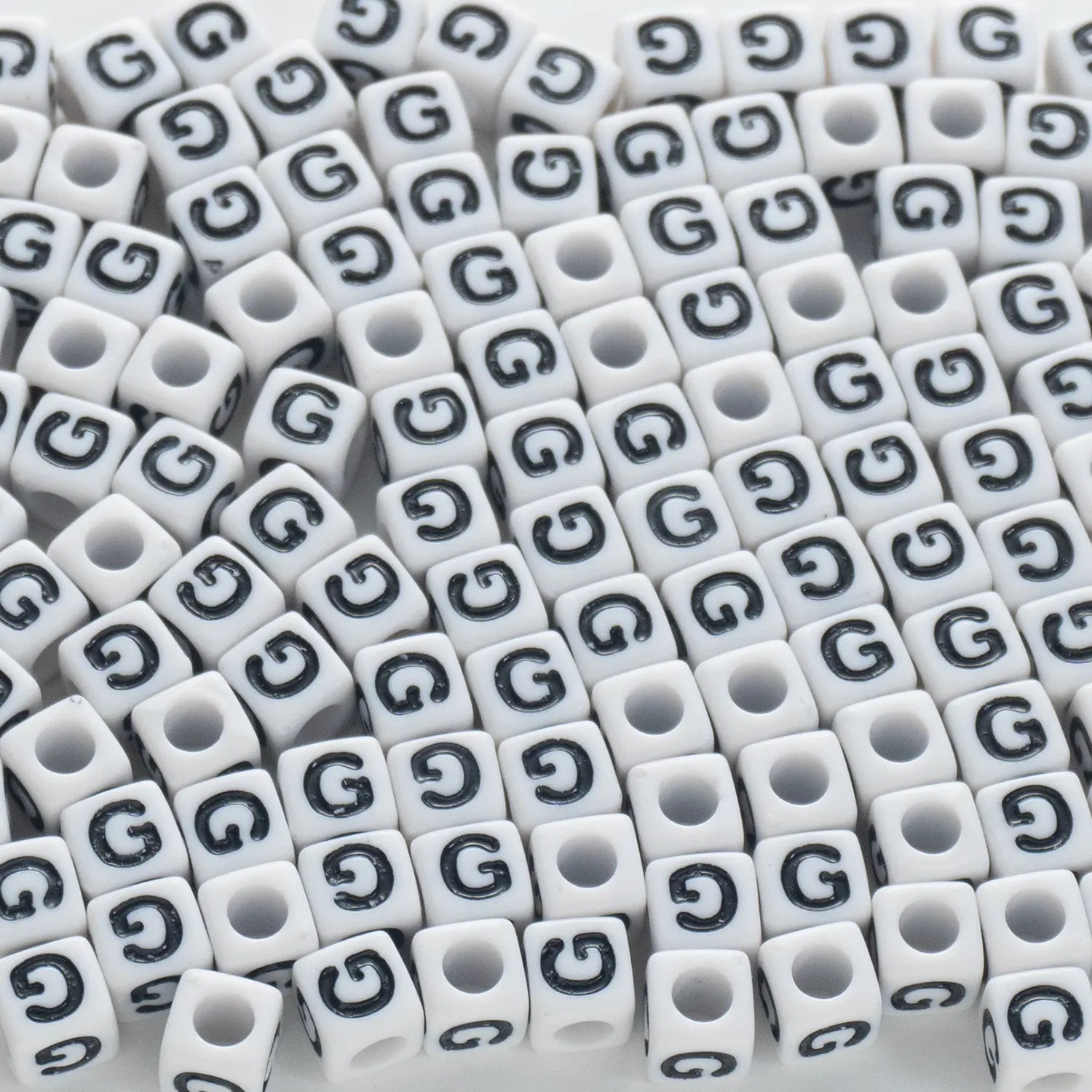 BW-00118-BD-02-black-letter-white-opaque-cube-alphabet-beads-single-g-7mm