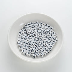 BW-00119-BD-01-black-letter-white-opaque-cube-alphabet-beads-single-h-7mm