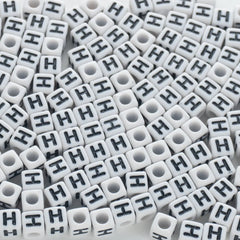 BW-00119-BD-02-black-letter-white-opaque-cube-alphabet-beads-single-h-7mm