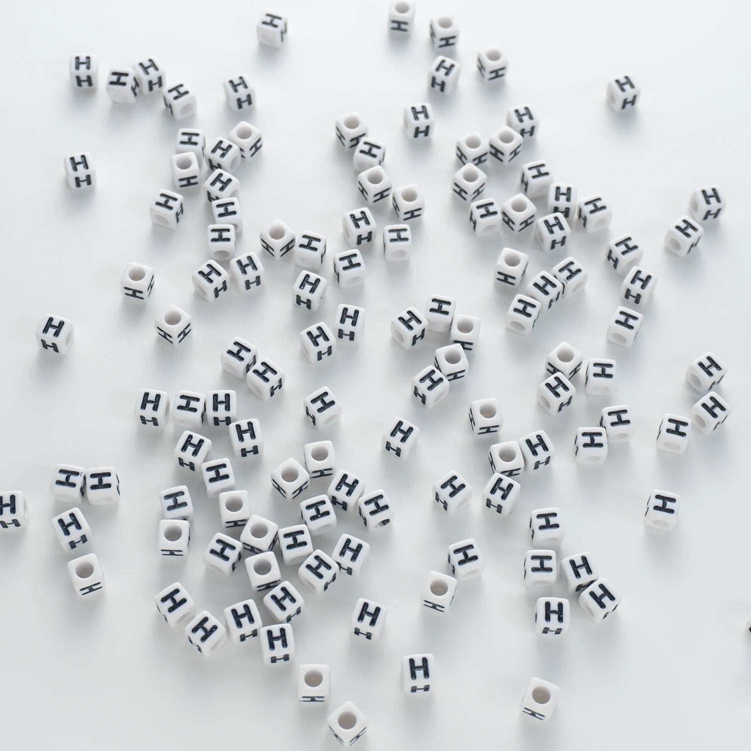 BW-00119-BD-03-black-letter-white-opaque-cube-alphabet-beads-single-h-7mm