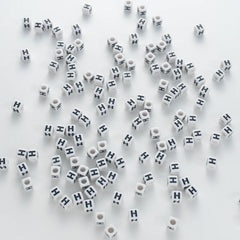 BW-00119-BD-03-black-letter-white-opaque-cube-alphabet-beads-single-h-7mm