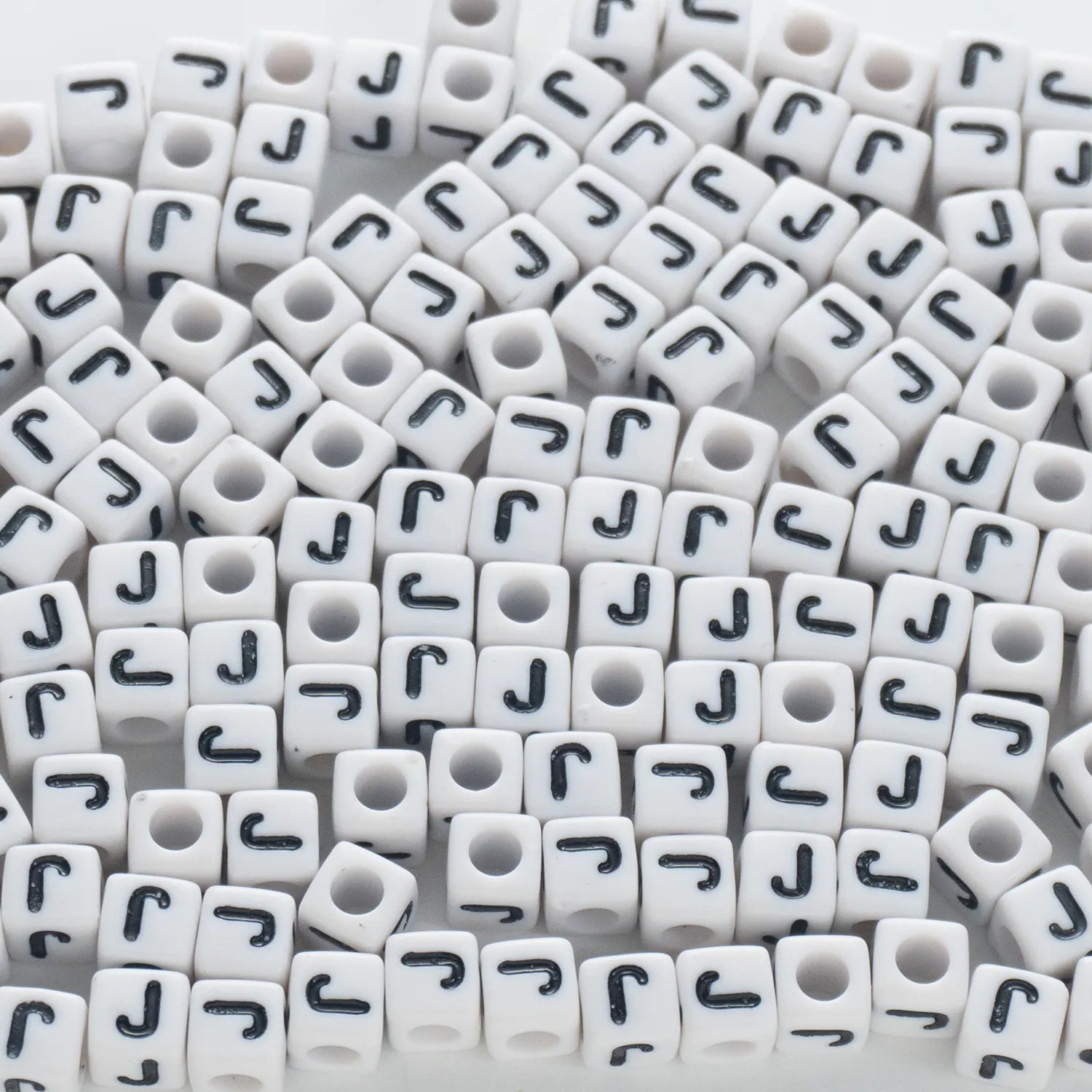 BW-00121-BD-02-black-letter-white-opaque-cube-alphabet-beads-single-j-7mm