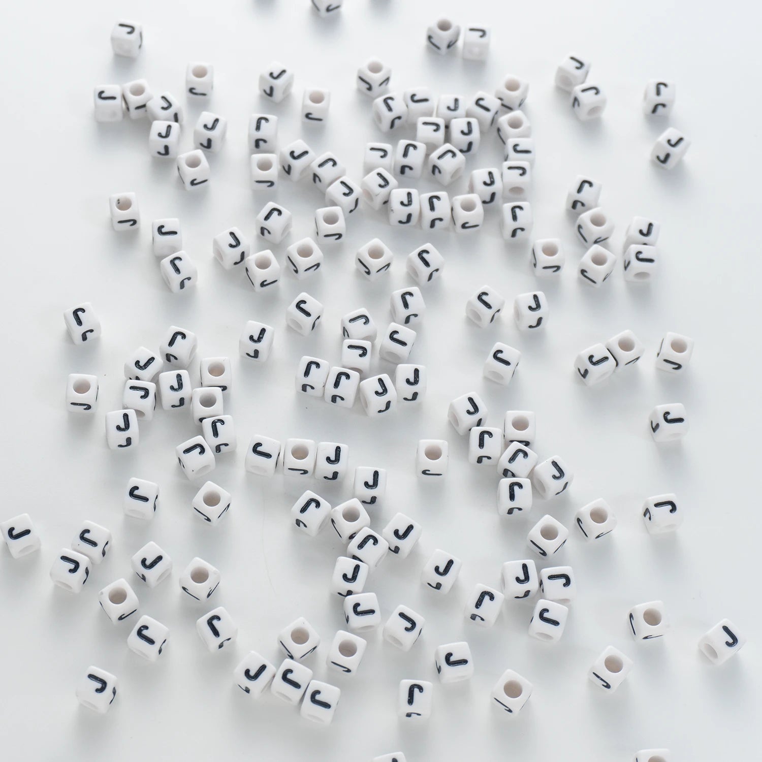 BW-00121-BD-03-black-letter-white-opaque-cube-alphabet-beads-single-j-7mm